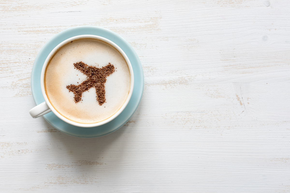 Coffee cup with plane crema